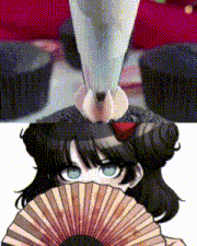 a girl with a fan and a cupcake on her head