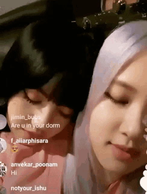 a couple of girls are laying next to each other and one of them says are u in your dorm