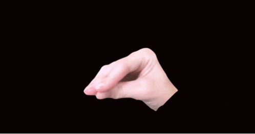 a woman 's hand is shown on a black background with her fingers crossed