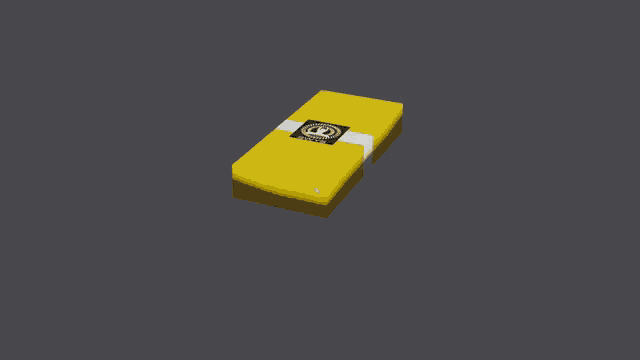a yellow item with a black and white circle on it