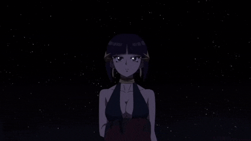 a woman in a black dress is standing in the dark .