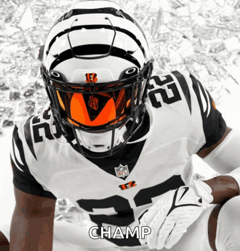a football player wearing a white jersey with the number 25 on it