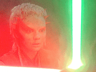 a pixelated image of a woman holding a green light saber