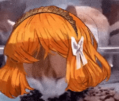 a close up of a person 's hair with a bow in it .