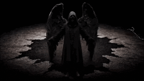 a grim reaper with his arms outstretched stands in the dark