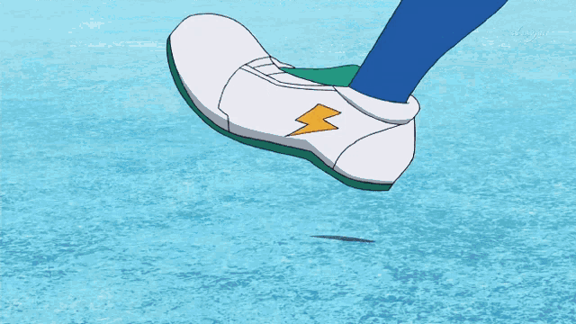 a close up of a person 's leg with a tv channel displayed