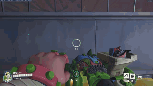 a screenshot of a video game shows a person holding a green object that says 700/100