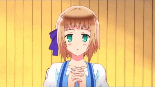 a little girl with brown hair and green eyes is praying