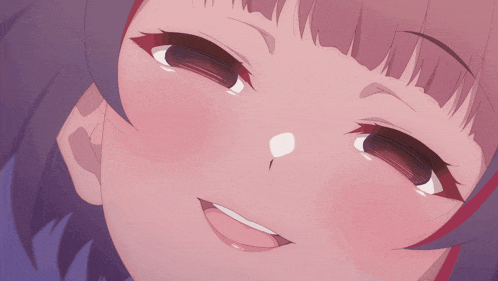 a close up of a girl making a funny face with her tongue out