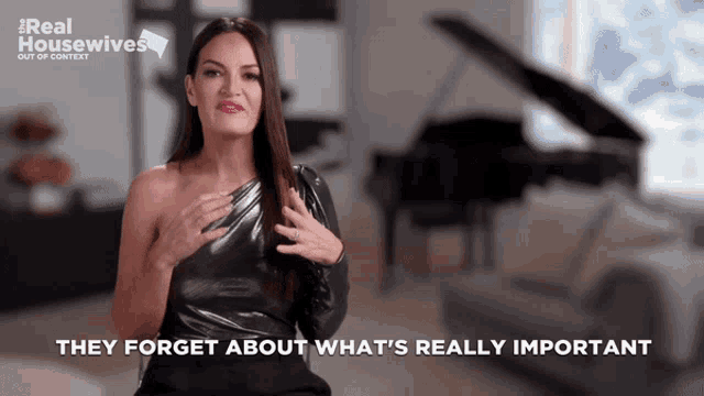 a woman says they forget about what 's really important while sitting in front of a piano