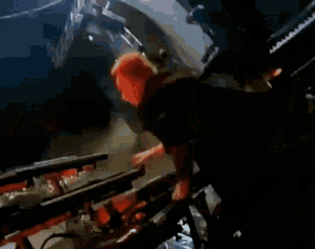 a blurry picture of a person holding a sword
