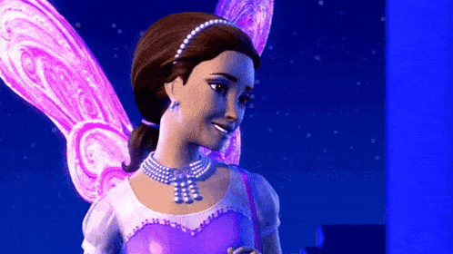 a barbie doll with fairy wings is wearing a purple dress and necklace .