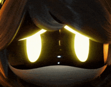 a close up of a cartoon character 's eyes with a yellow light coming out of them