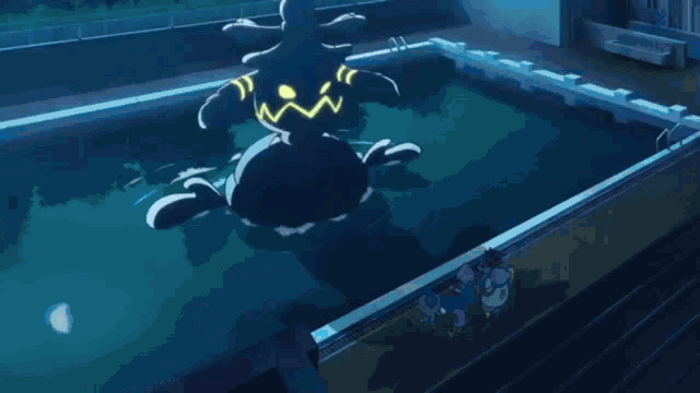 a person is swimming in a pool with a building in the background and a splash of water coming out of the pool .