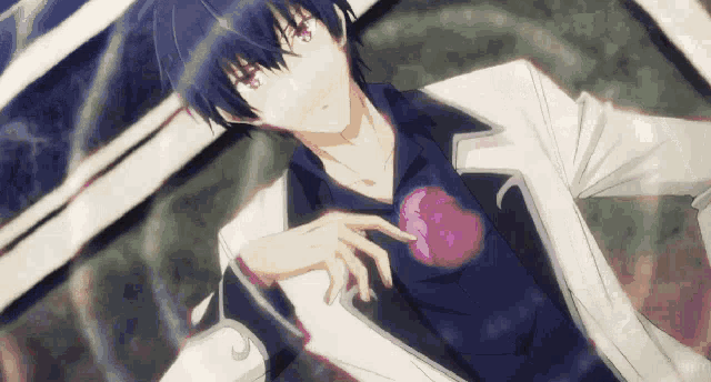 a close up of a person holding a heart in their hand