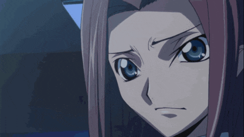 a close up of a girl 's face with a blue eye