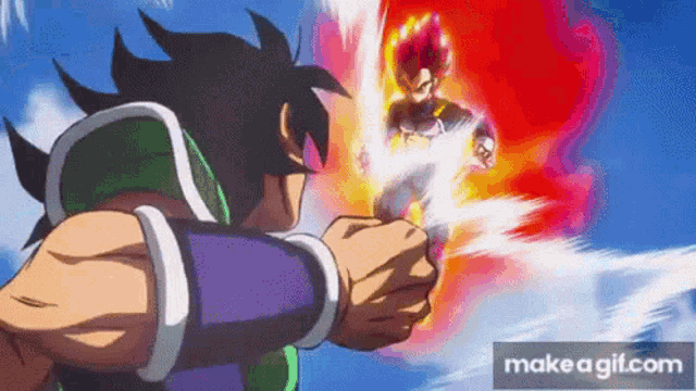 a man in a purple and green outfit is fighting another man in a red and orange outfit .