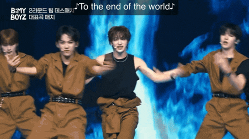 a group of young men are dancing in front of a blue background and the words " to the end of the world " are above them