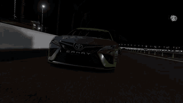 a race car with the number 18 on the side of it