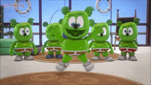 a group of gummy bears are dancing in a room with the word gummi bears on the bottom