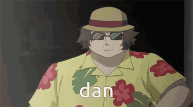 a man wearing a hat and sunglasses with the word dan written on his shirt