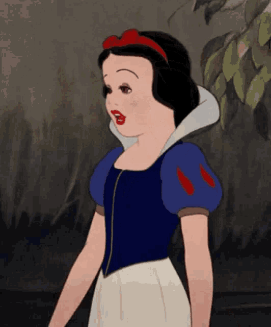 snow white from disney 's snow white and the seven dwarfs wearing a blue and white dress
