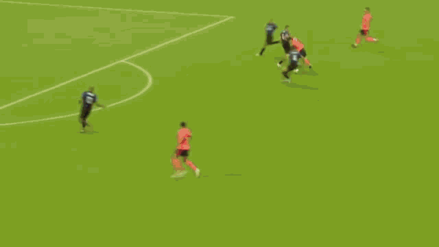a soccer game is being played with the score being 0-0