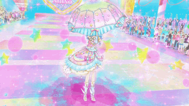 a girl in a colorful dress is dancing on a stage in front of a sign that says yume rhino