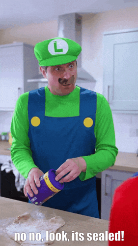 a man in a luigi costume is pouring something into a container