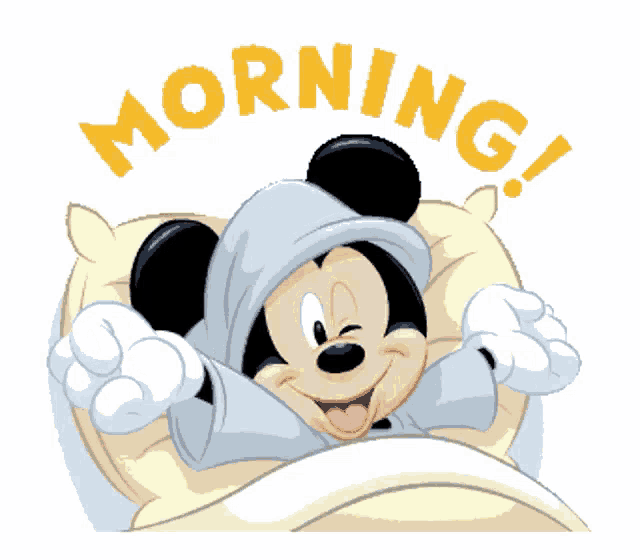 a cartoon of mickey mouse in bed with the words morning behind him