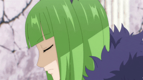 a girl with green hair has her eyes closed and a purple collar