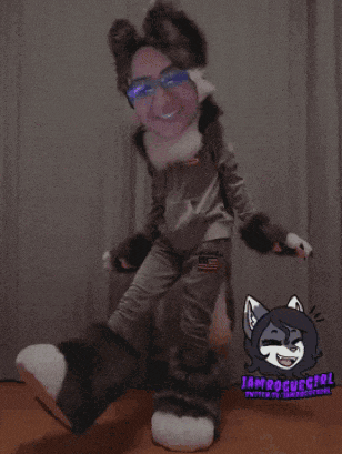 a person dressed in a cat costume with a cartoon of a cat on the bottom right corner