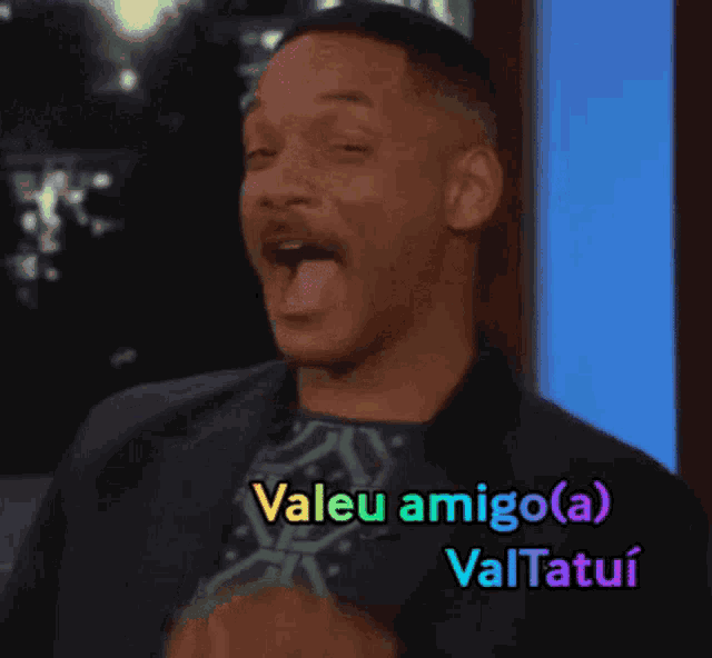 a man with his mouth open and the words valeu amigo ( a ) valtatui behind him