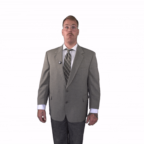 a man in a suit and tie has a button on his jacket that says ' i 'm a democrat '