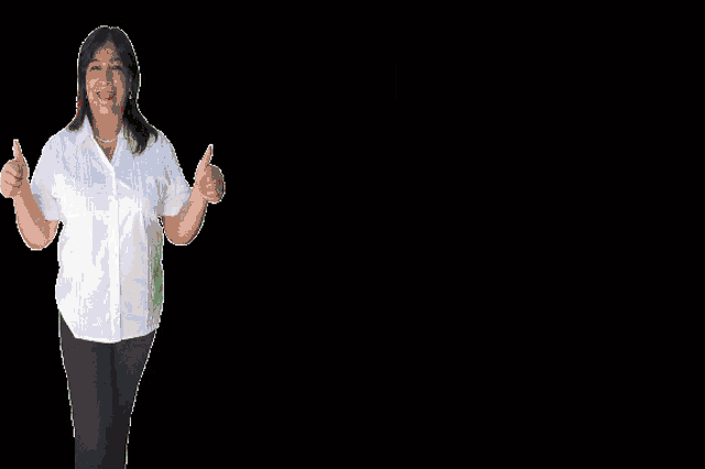 a woman is giving a thumbs up in front of a banner that says honestidad integritad