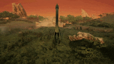 a rocket is sitting in the middle of a field