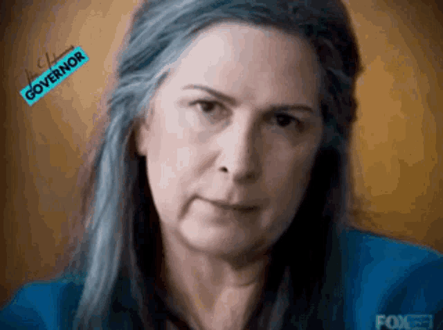 a close up of a woman 's face with the word governor on the bottom right