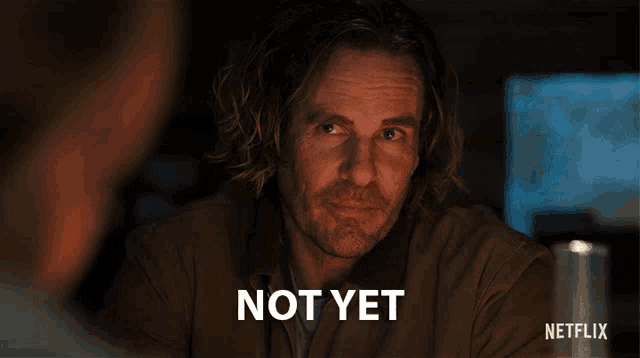 a man with a beard says " not yet " in a netflix ad