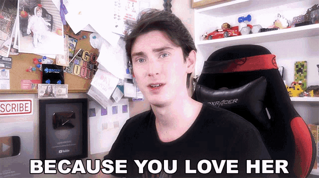 a man sitting in a chair with the words " because you love her " on the bottom