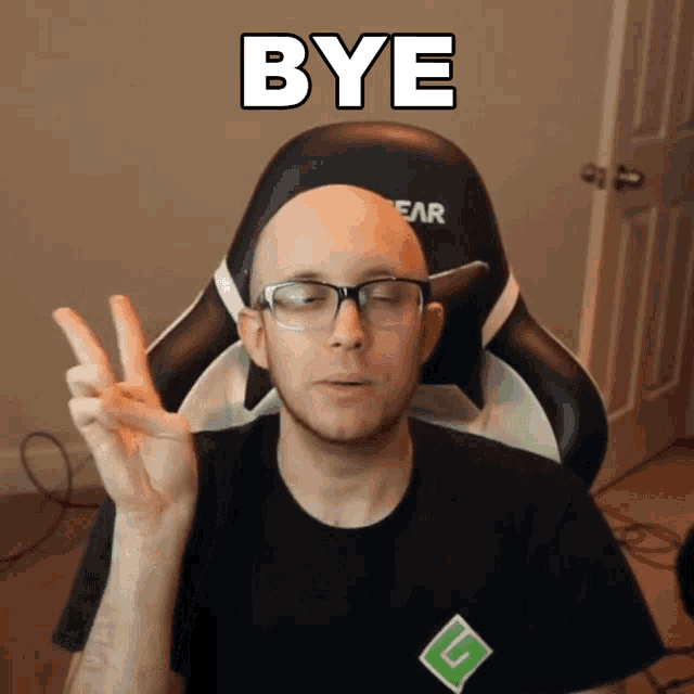 a bald man with glasses is giving a peace sign in front of the word bye
