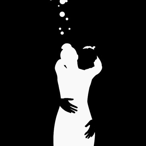 a silhouette of a woman hugging another woman with bubbles above her head