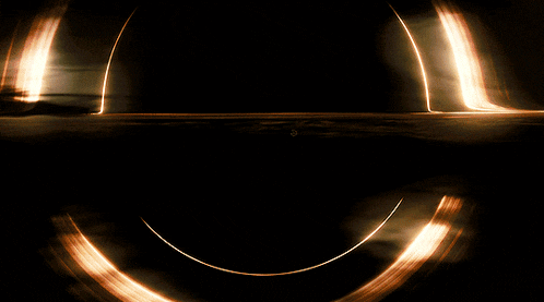 a glowing circle in the middle of a black background