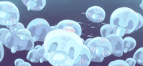 a bunch of jellyfish are floating in the ocean
