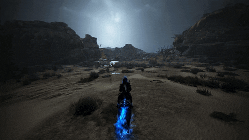 blue flames are coming out of the ground in the dark
