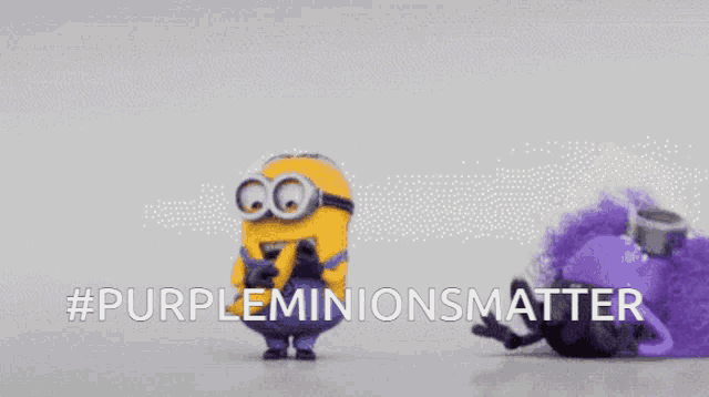 two purple minions are standing next to each other with the words #purpleminionsmatter above them