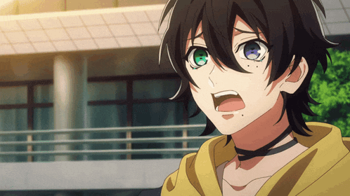 a boy with black hair and green eyes is wearing a yellow hoodie and choker