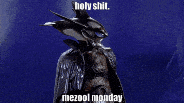 a picture of a shark with the words holy shit mezool monday