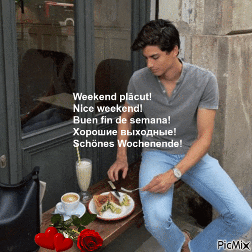 a man sits at a table with a plate of food and a cup of coffee and says weekend placut nice weekend buen fin de semana