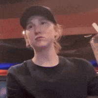 a blurry picture of a man wearing a hat