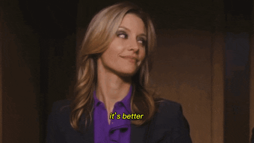 a woman says it 's better while smiling